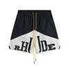 Rhude Designer Shorts Męskie Modne spodnie plażowe Sports Fitness Luksusowe wysokiej jakości szorty swobodne szybkie suszenie oddychające szorty Europejskie C3SI#