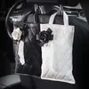 Nouveau classique camélia fleur voiture appui-tête tissu sac Auto siège suspendu en cuir papier boîte tour titulaire style voiture accessoires