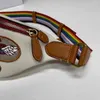 Bolso de diseñador en el pecho Diseñadores de cuero genuino CrossBody Bolsos de cintura Hombres Bolsos de hombro con honda Cinturón de mujer Monedero Mensajero Paquetes de viaje Bolso satchel multiusos Marrón MM