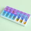 Neueste wöchentliche tragbare Reise-Pillendosen-Box, 7-Tage-Organizer, 14 Fächer, Pillenbehälter, Aufbewahrung, Tabletten, Vitamine, Medizin, Fischöle