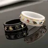 80% rabatt designer smycken armband halsband vit keramisk ring med gyllene kantbi
