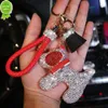 Yeni moda elmas kristal karikatür köpek anahtarlık örgü deri anahtar zinciri anahtar halkalar cazibe çantası otomatik kolye kadın kız anahtarlık hediyesi