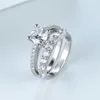 Anelli a fascia Set di anelli rotondi in zircone bianco Fidanzamento in cristallo di lusso femminile Set da sposa da sposa color argento per le donne