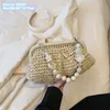 Großhandel Damen Umhängetaschen 2 Farben die beliebte Sommerferien-Strandtasche für Mädchen im westlichen Stil, gewebte Handtasche aus Muschelstroh, Handy-Geldbörse 12867#