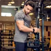 Męskie koszulki Kompresja Szybka sucha koszulka Mężczyźni Running Sport T-shirt Chuda koszula z krótkim rękawem Męska fitness Workbuilding Trening T-shirt T230601