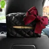 Nouveau mignon Bowknot siège de voiture appui-tête suspendu tissu support de la boîte multi-fonction en cuir papier tour organisateur style voiture accessoires