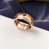 Designerband Ring Lyxringar för män Kvinnor Titanstål Graverat Bokstavsmönster Lovers Smycken Lämplig för många applikationer