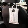 Nouveau classique camélia fleur voiture appui-tête tissu sac Auto siège suspendu en cuir papier boîte tour titulaire style voiture accessoires