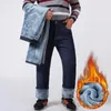 Jeans da uomo Plus Size 42 44 46 48 50 52 Uomo Inverno Caldo Business Casual Blu Nero Dritto Pantaloni di jeans larghi Pantaloni di marca maschile