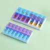 Nyaste veckovis bärbara resepiller Box 7 Days Organizer 14 Grids Pills Container Lagring Tabletter Vitamin Medicin Fiskoljor