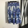 23ss conjunto de saia de roupas femininas de grife porcelana azul e branca estampada uma linha decote manga curta top sem alças cintura alta meia saia conjuntos de roupas femininas a1