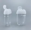 En gros 30 ml bouteille de désinfectant pour les mains en plastique PET demi-rond bouteille à capuchon rabattable bouteille de désinfectant pour enfants JL5699