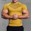 T-shirts pour hommes New Men Gym T-shirt Haute élasticité musculation fitness à séchage rapide à manches courtes sports pour hommes Casual tops tendance running T-shirt T230602