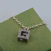New 2023 designer jewelry bracelet necklace ring Ancient family square made of old style hollow pattern pendant couple's clavicle chain