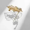 Pins Broches vrouwen eenvoudige parel kristal dubbele boom blad vrouwen luxe geel goud zirkoon legering plant broche veiligheidsspeld G230529