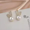 Elegant blomma imitation pärla kristall studörhängen för kvinnor stil bröllop smycken tillbehör brincos grossist gåva