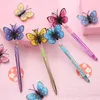 Pcs/lot créatif papillon lumière Gel stylo mignon 0.5mm encre noire stylos neutres cadeau promotionnel fournitures scolaires de bureau