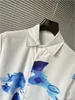 Mężczyźni designerskie koszule Summer Shoort Sleeve swobodne koszule moda luźna polo w stylu plażowym oddychające tshirts tee ubrania m-3xl lk46