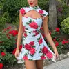 Élégant fleur imprimer Mini Robe pour les femmes Robe 2023 été nouveau col roulé évider sans manches moulante Robe courte