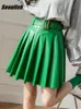 تنورة Seoulish Green Pux Pu Leather Leather Closted Women’s Tartts with Bulted 2022 New High High High Sexy Mini Terts Female Autumn Winter