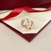 Projektantki kolczyki dla kobiety luksusowa biżuteria kobiety męskie panie orecchini słynne luksusowe obręcze z diamentowym różowym złotem plisowane cyrkon złoty kolczyk szlachetny Ohrringe