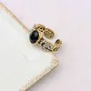 50% rabatt designer smycken armband halsbandsring svart levande flash diamant middle mångsidig antik familj hand ring kvinnliga smycken