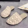 Pantofole stile etnico scavato Baotou metà femminile pizzo maglia fata 2023 scarpe da donna alla moda e minimalista