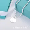 Designer Brand White Copper Silver Tiffays Tiffays Key Heart Alaborato La collana per tallone Buddha per donne CNC SEAL SEAL LETTURA AMORE PENDANTE ROUND COLLARBONE