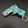 Party Favor Mini Keychain Alloy Elastic Rubber Band Gun Toy Shooting Pistol Kid Outdoor Folding Leather Pojky Toys