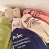 T-Shirts Kinderpullover Frühling Jungen und Mädchen Alphabet Stickerei Baby Rundhalspullover Innenbekleidung 230601