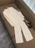 2023 Autunno bianco / nero con strass due pezzi Pantaloni Set manica lunga con risvolto con risvolto Blazer con perline Top Pantaloni a gamba dritta Completi O3L012706