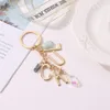 Schlüsselanhänger Glück Brief Anhänger Schlüsselanhänger Segen Initiale Schlüsselanhänger Goldfarbenhalter mit Kristall und Steinen Geschenk für Freunde