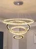 Lámparas colgantes Sala de estar de lujo Candelabro de cristal Iluminación LED plateada moderna Escalera de múltiples anillos Dormitorio principal Luz de comedor