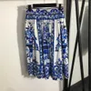 23ss womens designer clothing skirt set Blue and white porcelain printed one line neck short sleeve strapless top high waist half skirt sets womens clothing a1