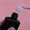 Narzędzia 20pcs rzęs kleju wtyczka butelka klejek kubka dysza dysza klejąca kropka indywidualna rzęsy fałszywe narzędzia do przedłużania rzęs