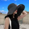 Chapeaux à large bord UPF 50 grand soleil de voyage pliable résistant aux UV femmes printemps et été parasol couleur unie coton décontracté seau chapeau