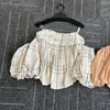 女性のブラウスワクタしわく甘いクールなセクシーなトップ2023夏の新鮮な格子縞のストラップブルーサフェミニナオフショルダーラップチェストシャツ