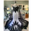 Vintage White Black Mermaid Wedding Dresses Spaghetti Backless Lace Applique Bohemian Beach Garden Bridal Gown Robe de Mariee