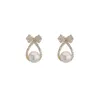 Boucles d'oreilles en diamant avec nœud de luxe pour femmes