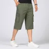 Mäns shorts sommar med flera fickor med dragkedja med en crotch casual Bermuda löst passande mäns råvarukorts plus storlek 5xl p230602