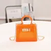 Дизайнерские сумочки девушки -желе сумочки прозрачные мини -бренд -бренд цветной блестящий блеск из ПВХ сумки для принцессы мода на плечо пакет мешков с мешками для хранения BC777