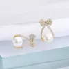 Boucles d'oreilles en diamant avec nœud de luxe pour femmes