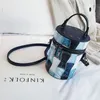 Новая опрятная кожаная женская сумка в ретро -ретро -круглое ведро мини -маленькая сумка сумочка поперечная сумка для поперечного телека
