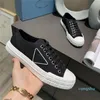 Scarpe casual di alta qualità Designer Donna 2021 Sneakers basse in tela di cotone e nylon con scatola corretta Scarpe da ginnastica stampate in gomma Scarpa causale triangolare