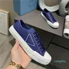 Scarpe casual di alta qualità Designer Donna 2021 Sneakers basse in tela di cotone e nylon con scatola corretta Scarpe da ginnastica stampate in gomma Scarpa causale triangolare