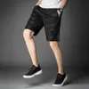 Shorts masculinos na moda com joelhos finos e suor longo suor da academia masculina shorts esportivos soltos vestindo P230602