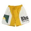 Shorts de créateurs Rhude Summer Beach Pantalons confortables élégants de couleur vive Shortsmen de haute qualité Street Wear Rouge Bleu Noir Violet Hommes Taille courte S-XL 4LMO