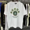 Designer Roupas Tees 2023 Verão Nova Moda Rhude Versátil Verde Impressão Solta High Street Casual Manga Curta Camiseta para Homens Mulheres Cotton67