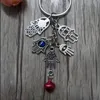 50 Pçs Moda Chaveiro DIY 25mm Chaveiro Turquia Blue Eye Evil Cabala Fatima Hamsa Hand Bell Charms Chaveiro Bolsa Decorativa Presente 185J