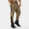 Calças masculinas fiess casual calças elásticas homens musculação roupas casuais joggers suores calças de treinamento muscular dos homens do verão